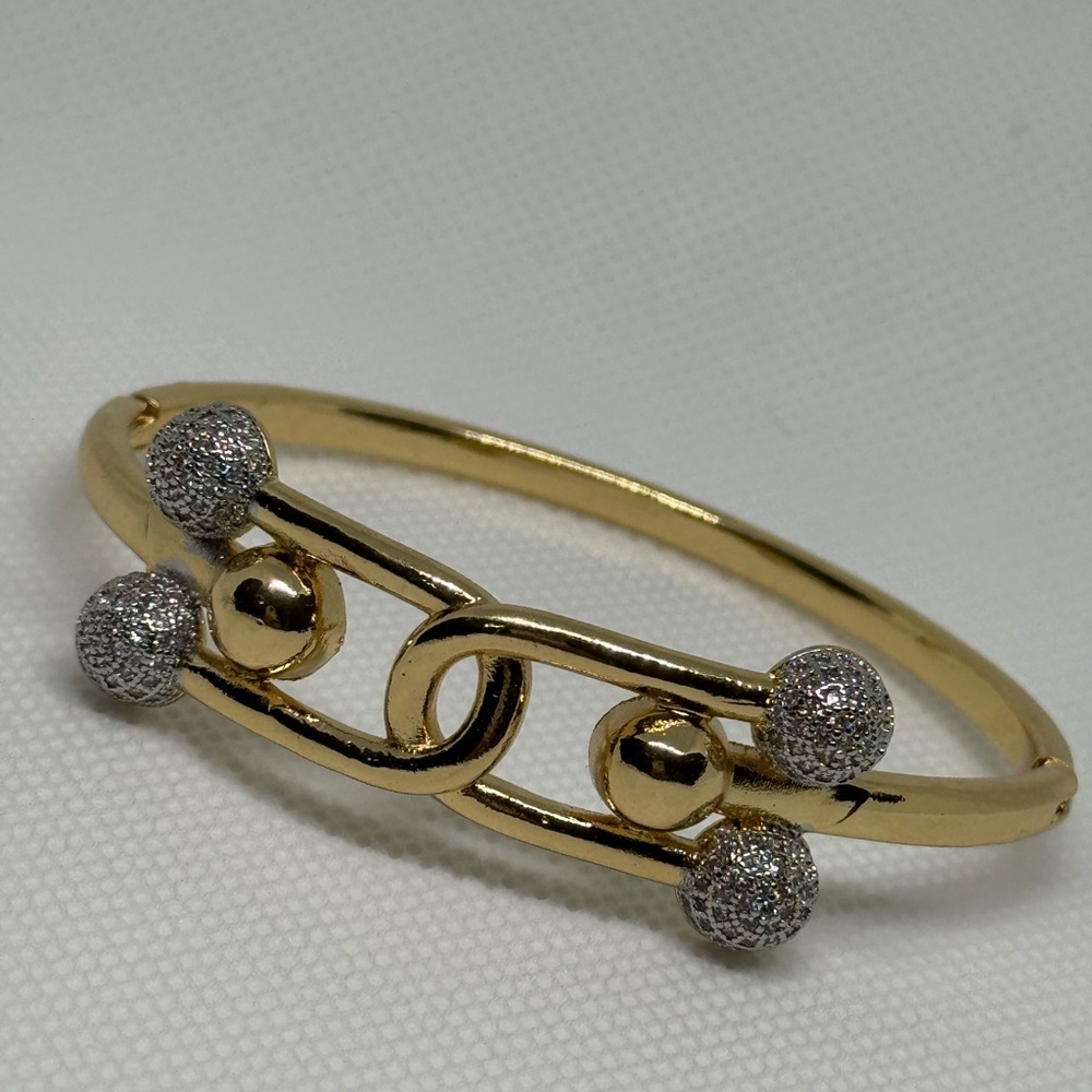 Elegant Gold and Silver Bracelet